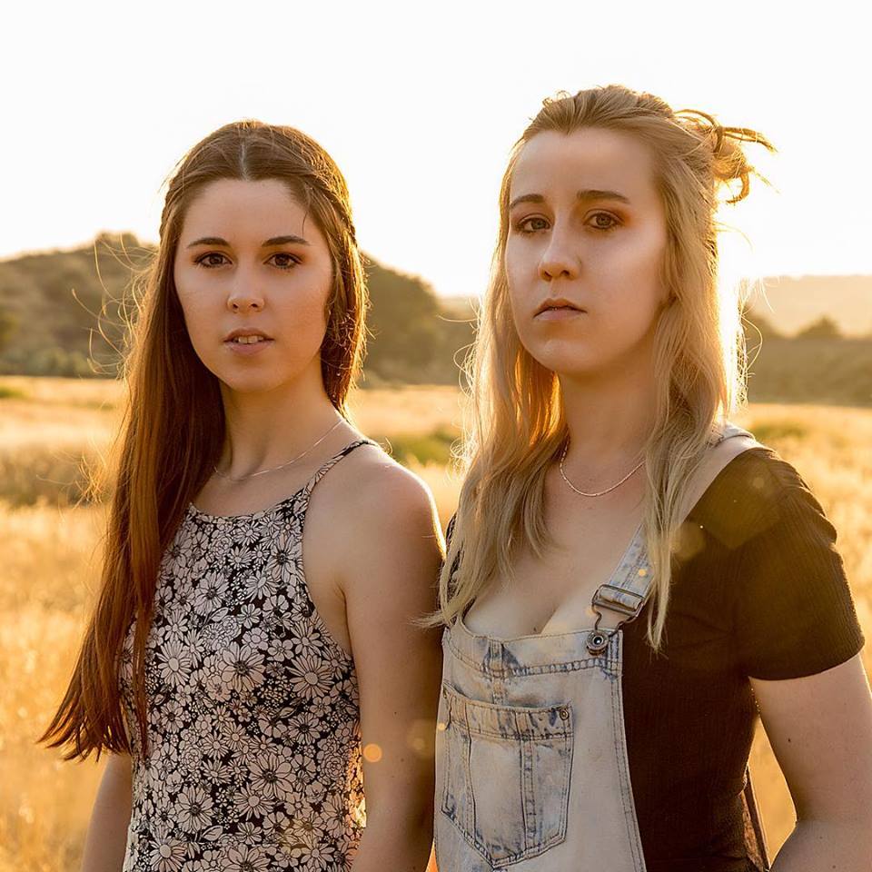 Two young thin women wearing 16" Sterling Silver 925 chains