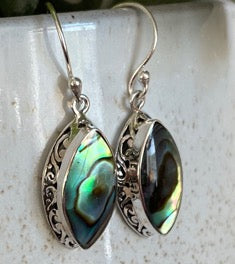 Abalone marquise shape sterling silver earrings.  These earrings drop about an inch and have lovely silver work that the abalone is set into.