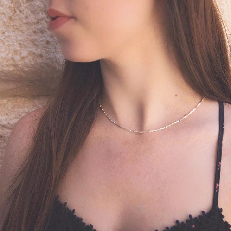 16" 1.5mm Sterling Silver 925 Box change on a thin young woman.