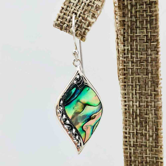 Abalone and Sterling Silver Earrings. Fish hook pierced earrings. Abalone pierced earrings. They hang about an inch and a quarter. A very lovely unique shape.