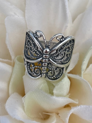 Butterfly sterling silver ring. The length of the ring is just over an inch. This is a very nice size ring, perfect for any finger length.