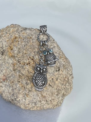 Sterling Silver Owl Pendant with Blue Topaz Eyes