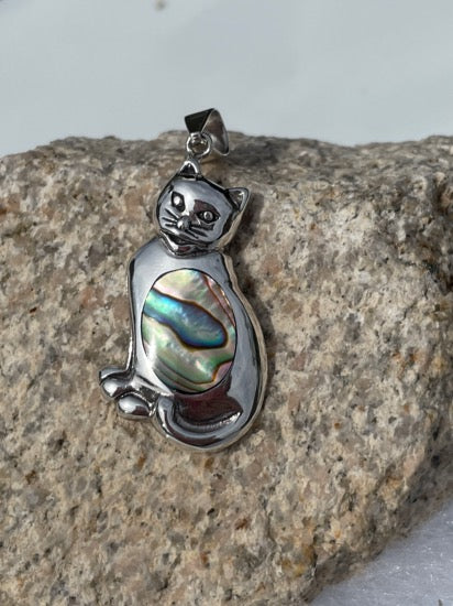 Sterling silver cat pendant with abalone shell in the middle of the cat. The pendant is about an inch long and cat lovers will adore this pendant.