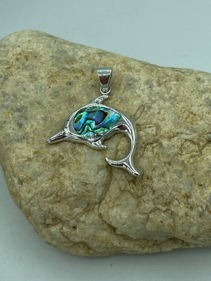 Sterling silver abalone dolphin pendant. This pendant hangs about an in. The abalone is genuine and shimmers.