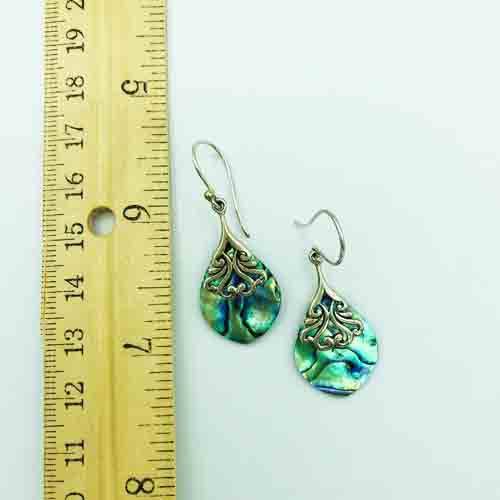 Abalone and Sterling Silver Earrings. Abalone sterling silver pieced drop earrings. Tear drop shape. They hand a little over an inch. Genuine Abalone. Hand made in Bali.